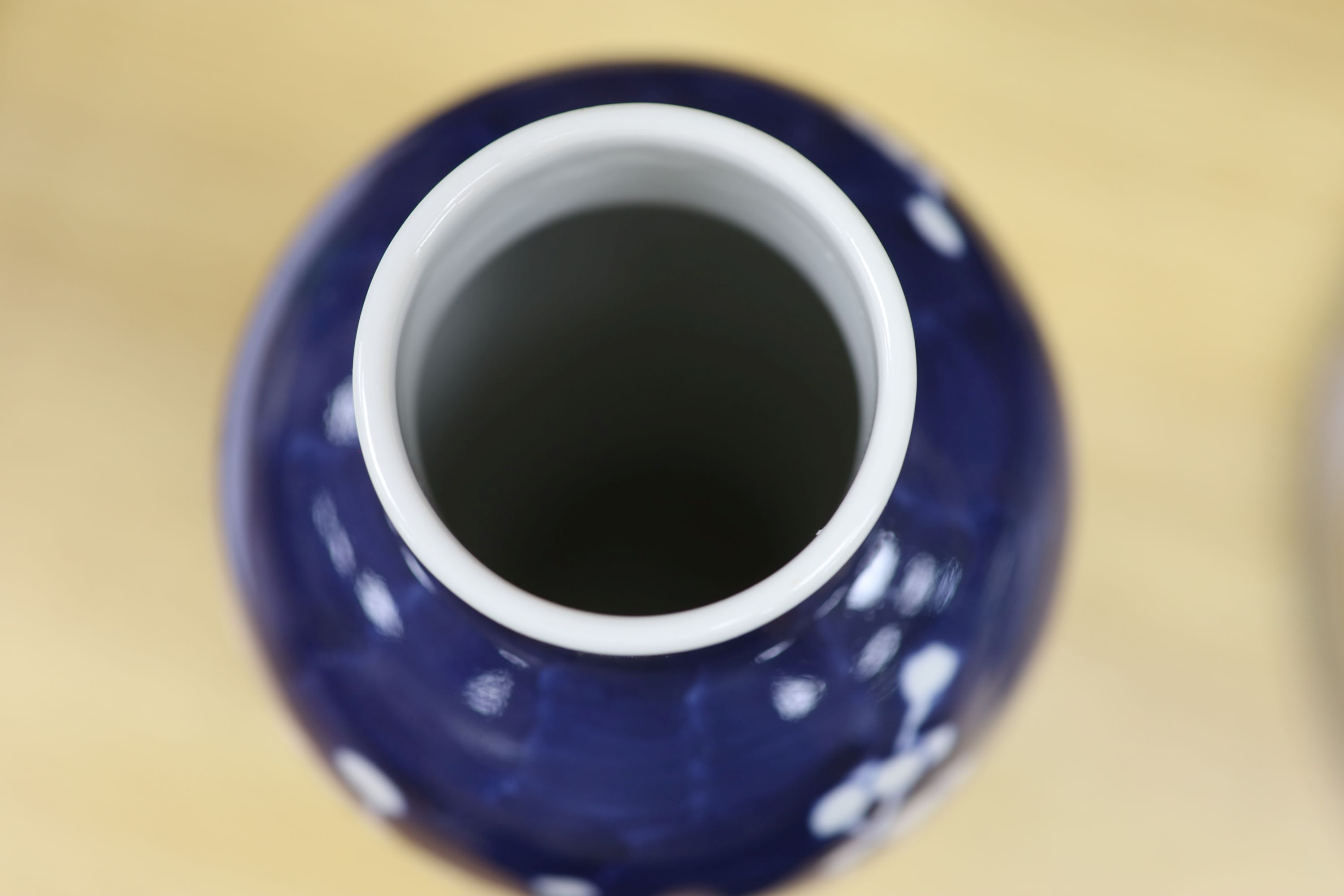 A Chinese blue and white cylindrical vase, another vase and cover and a blue and white jar and cover, together with a cloisonne vase and a bronze censer, tallest 32cm